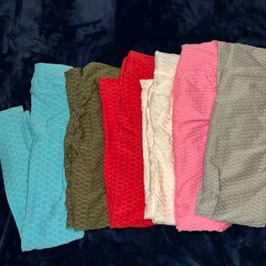 New with tags. Never worn ruched tights/workout capris, all colors.